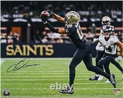 Chris Olave New Orleans Saints Signed 16 x 20 Catch in Black Photo
